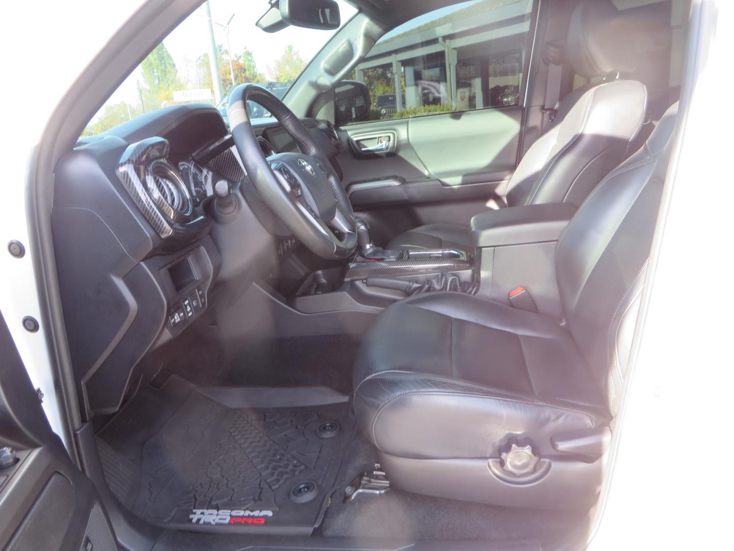 2019 White /black Toyota Tacoma TRD OFF-ROAD Double Cab (3TMAZ5CN4KM) with an 3.5L engine, automatic transmission, located at 2630 Grass Valley Highway, Auburn, CA, 95603, (530) 508-5100, 38.937893, -121.095482 - TRD Offroad 2WD sitting on Fox 2.5 remote reservoir DSC Coil-overs, Total Chaos upper control arms, Rigid Industries Dually side shooter leds, Fuel Rebel wheels, Nitto Ridge Grappler tires, and window tint. - Photo#19